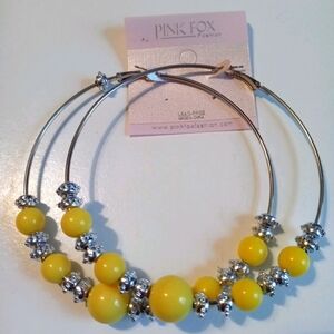 Brand new yellow and silver big earrings